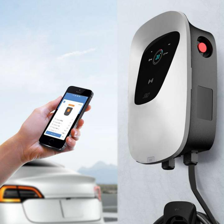 A person is using an application on their phone to view information about the AC EV Charger.