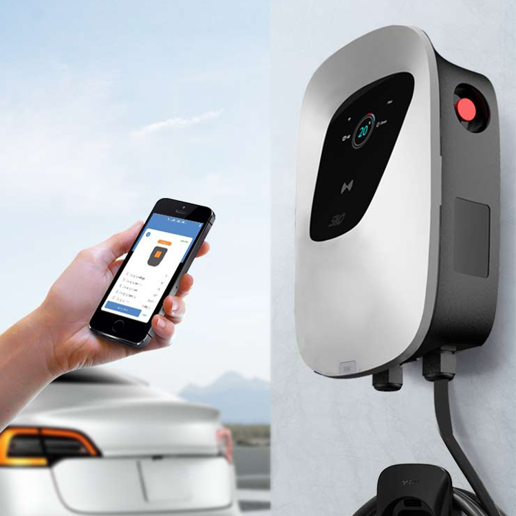 A man charging his electric car at home
