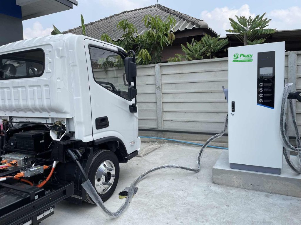 A large electric van is being charged using Pilot X Piwin's DC EV Charger Stations.